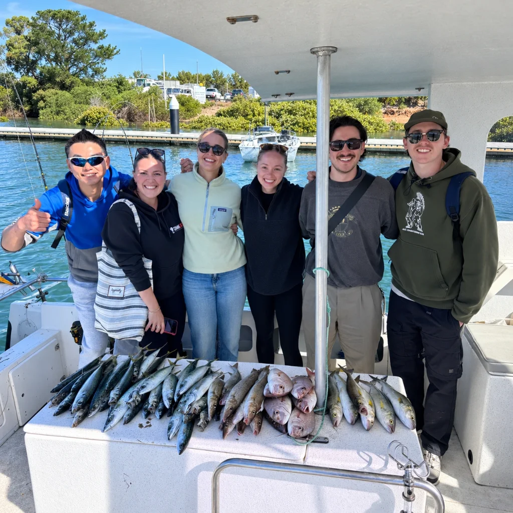 A group with their bag of King George Whiting
